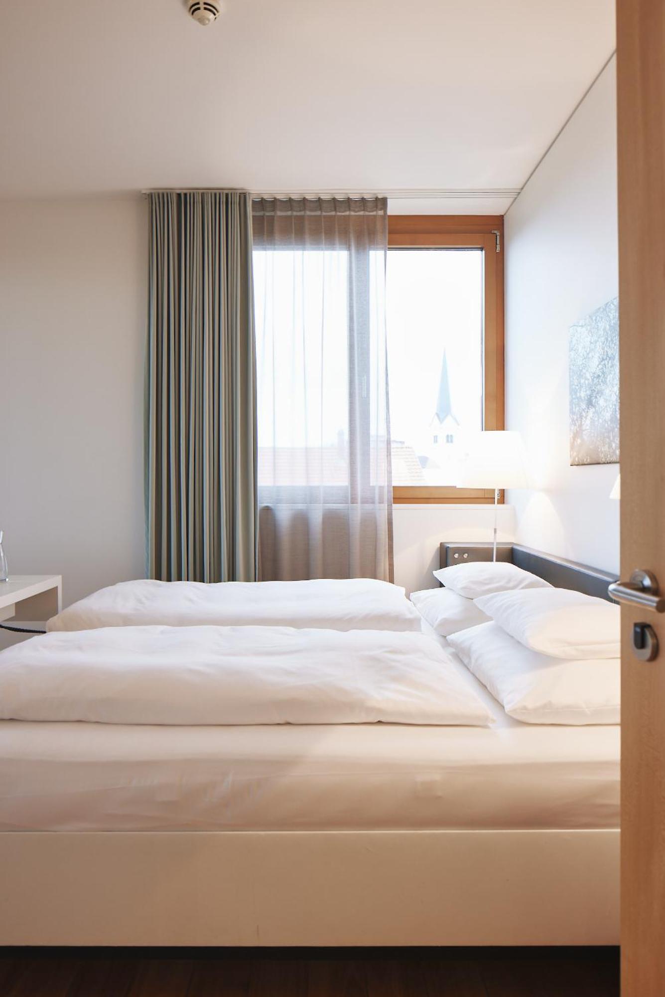 Hotel Am See Hard Bagian luar foto